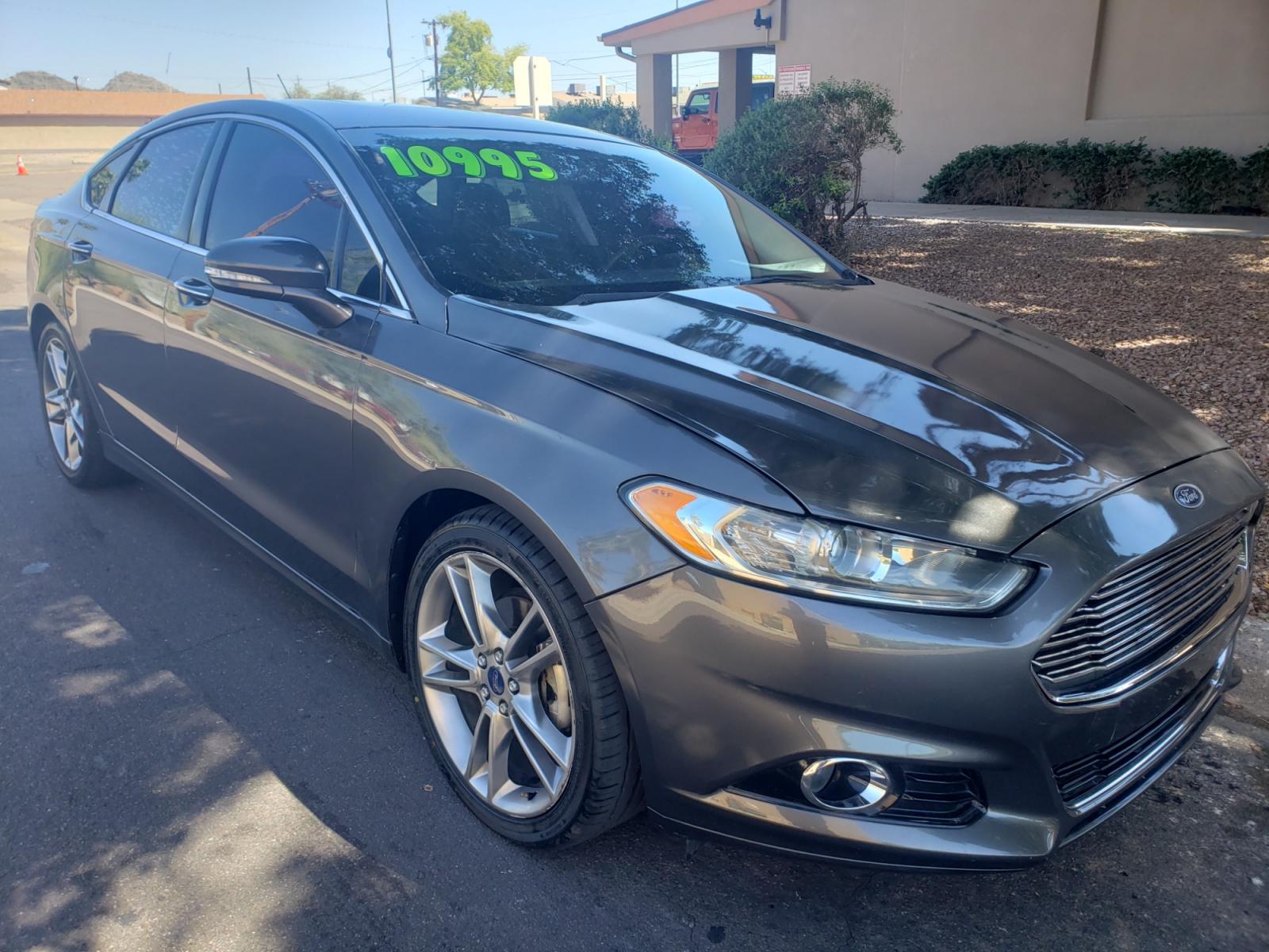 2016 /gray and black Ford Fusion titanium (3FA6P0K99GR) with an 2.0L L4 DOHC 16V engine, 4-Speed Automatic transmission, located at 323 E Dunlap Ave., Phoenix, AZ, 85020, (602) 331-9000, 33.567677, -112.069000 - Photo #2
